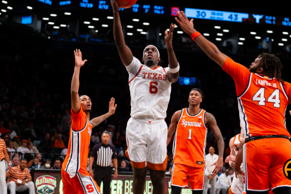 Arthur Kaluma goes up for Layup